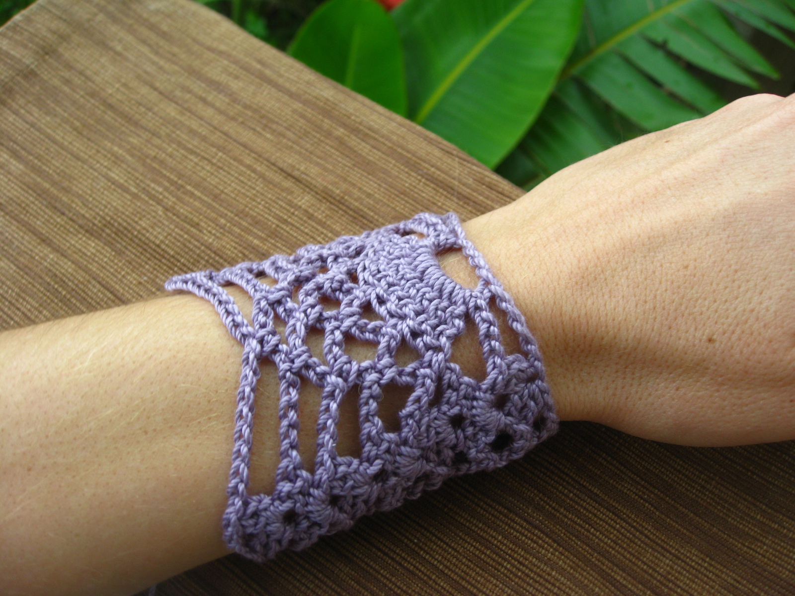 Crochet lace bracelet on a woman's wrist