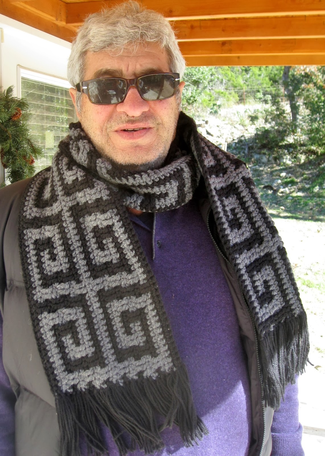 Man wearing the Andras crocheted scarf