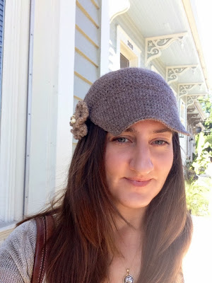 Tan crocheted cap with small stitches