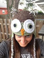 Front/top view of a very large owl crocheted hat